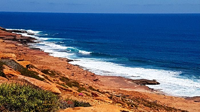 Rugged Red Bluff meets the Indian Ocean